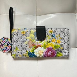 Bello Tutti wristlet/wallet NWT. Measures 8 1/2 by 4 1/2 closed.